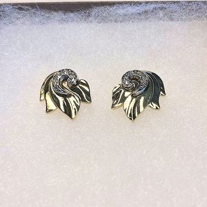 Gold and rhinestone earrings.